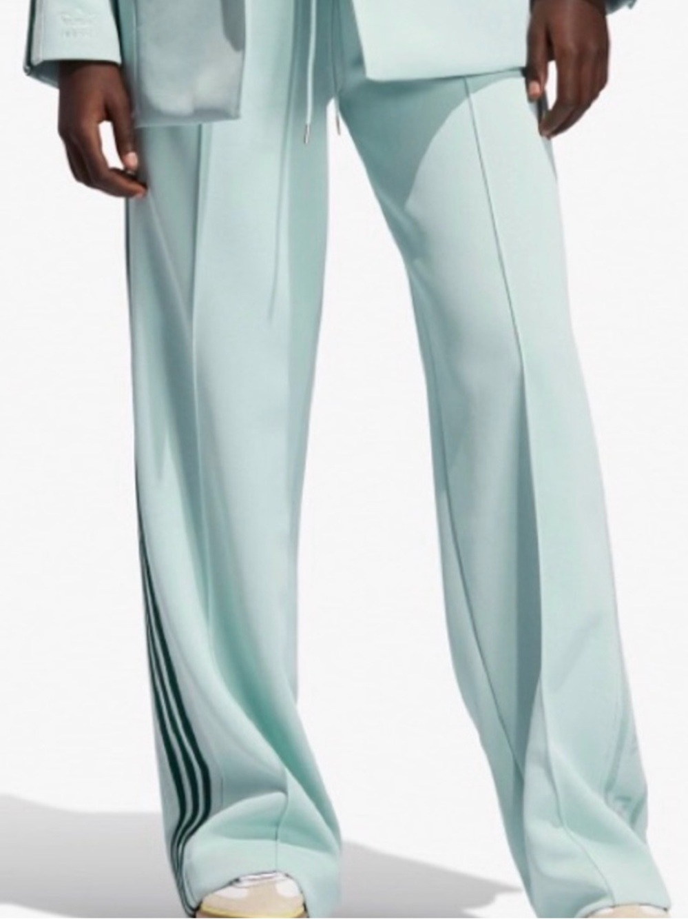 ADIDAS X IVY PARK (Beyoncé)
Wide Leg Track Pants In Mint Green. Size 4X